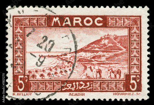 vintage stamp from Morocco depicting a traditional scenic view
