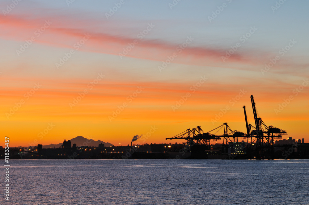 shipping crane and mt. baker at sunrise