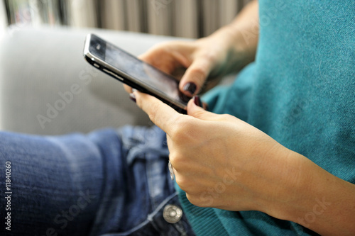 Woman sending a SMS messaging