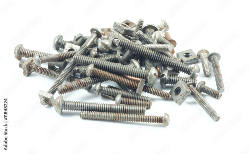 Assortment of various sized old nuts and bolts. Assortment of various sized old nuts and bolts.