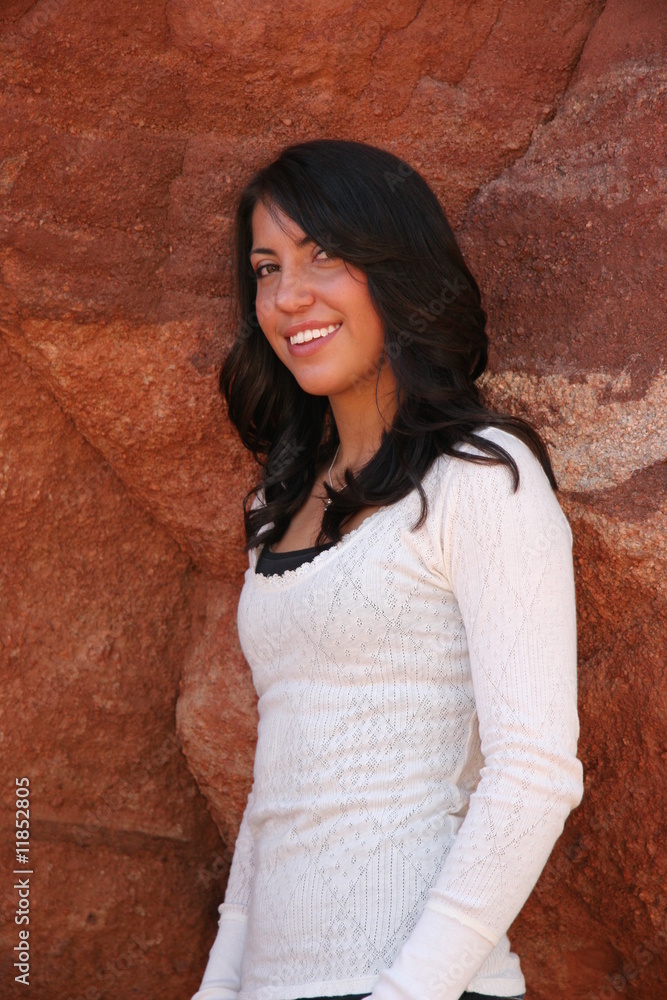 Pretty Teen Girl With Outdoor Rock Background