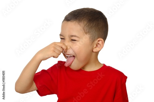 kid holding his nose from bad odor, isolated on white
