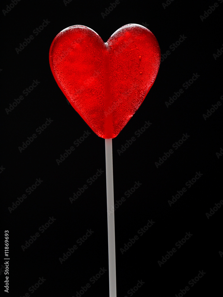 Red heart-shaped lollypop