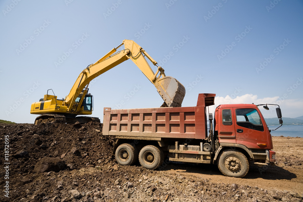 excavator and  truck