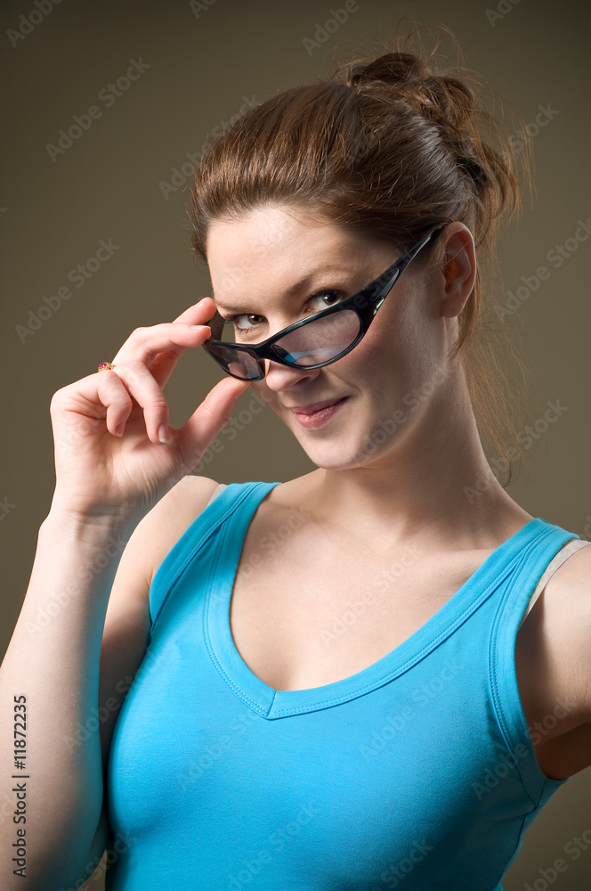 Beautiful Woman Tipping Sunglasses or Shades w/ Sexy Look Beautiful Woman Tipping Sunglasses or Shades w/ Sexy Look