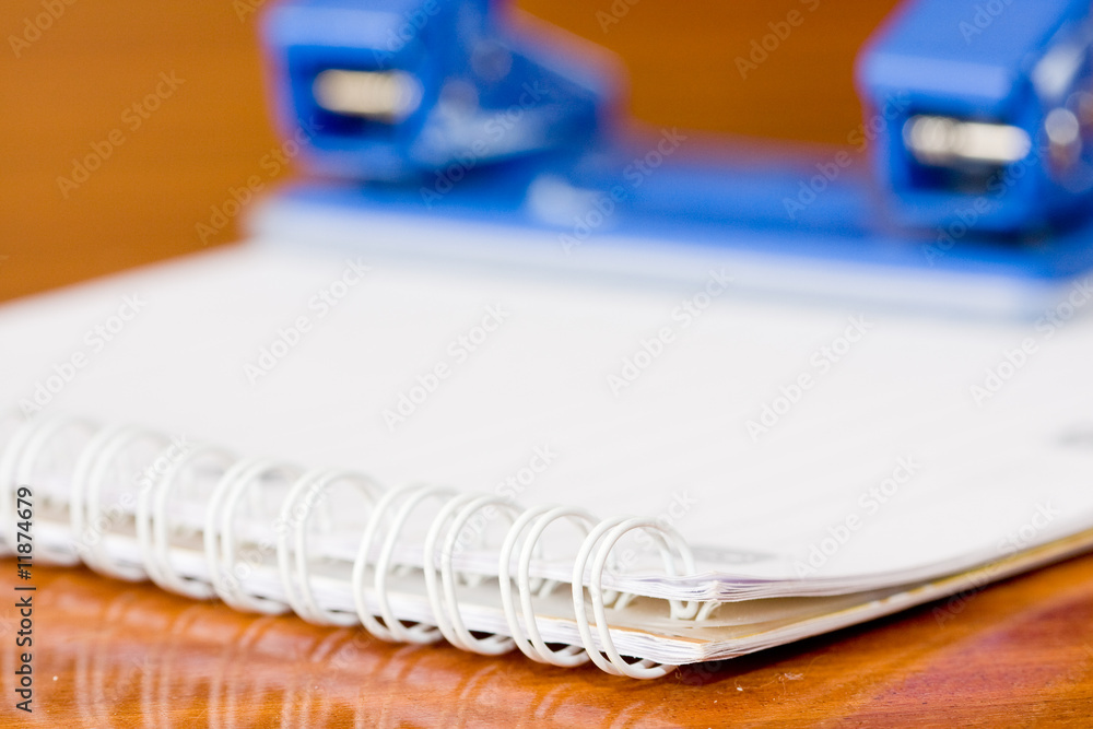 Notebook and perforator Notebook and perforator
