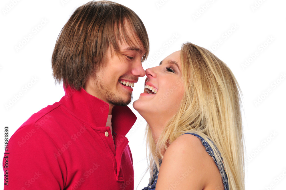 Young couple laughing and looking at each other Young couple laughing and looking at each other