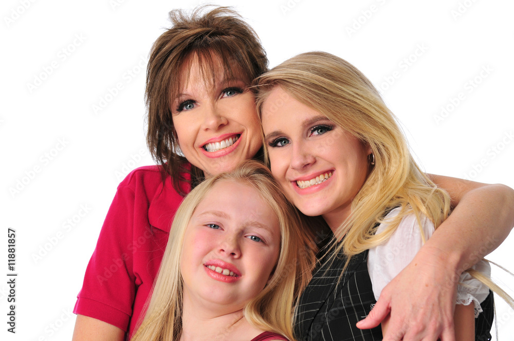Mother and daughters smiling Mother and daughters smiling