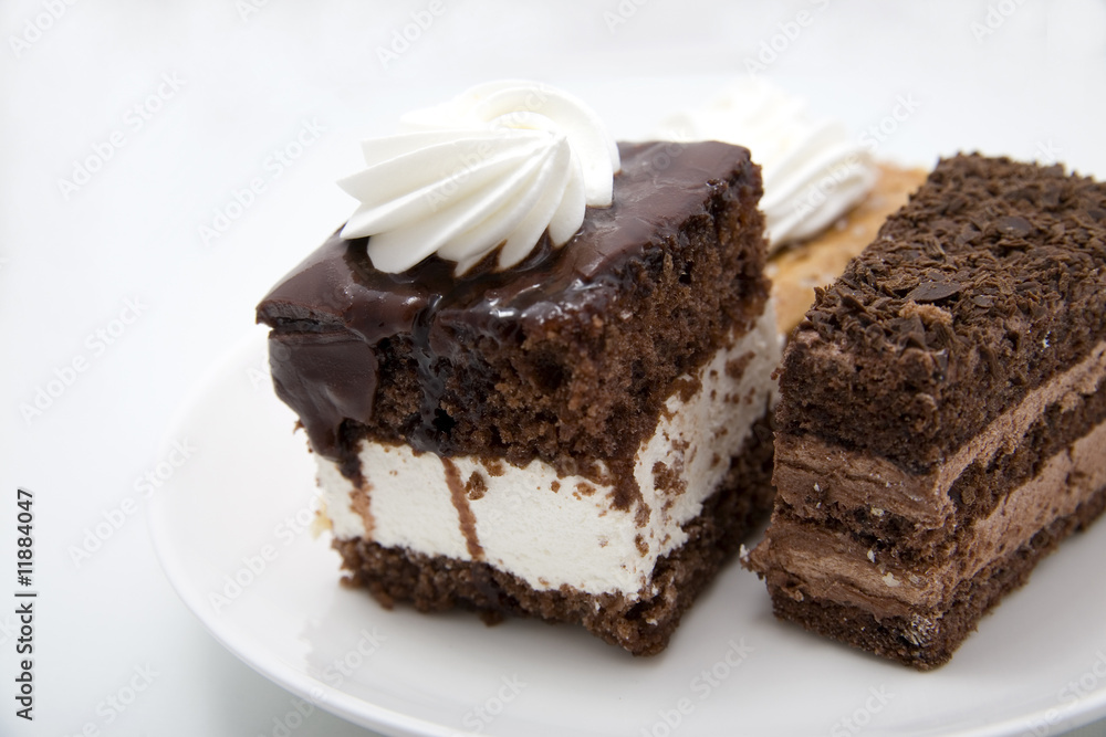 Two chocolate cakes on white background Two chocolate cakes on white background