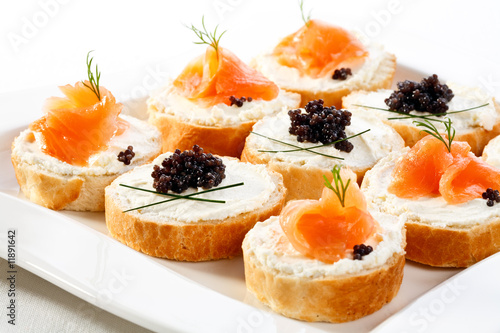 Mini sandwiches - bagel with cream cheese,  salmon, caviar