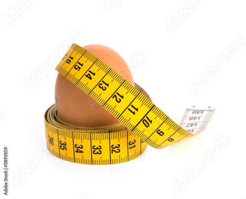 Egg with meter on white. See portfolio for similar Images