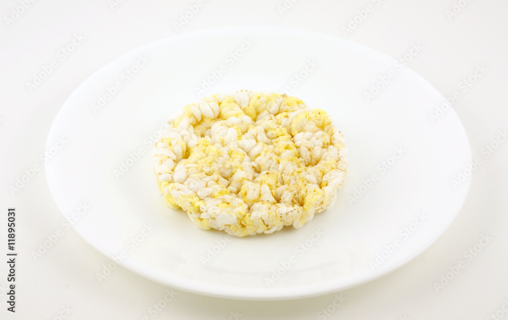 Rice cake on a white plate ready to eat. Rice cake on a white plate ready to eat.