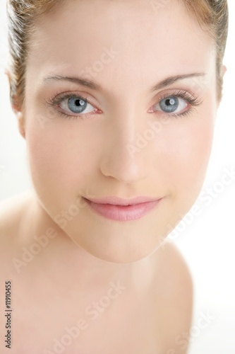 Smiling beautiful adult woman portrait on white