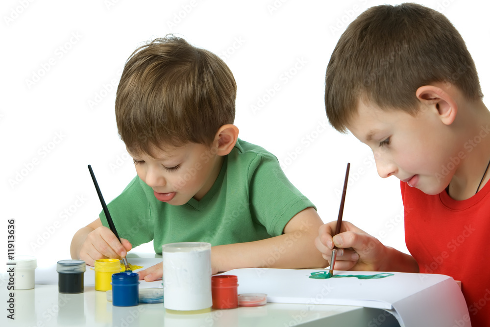 Two boys painting