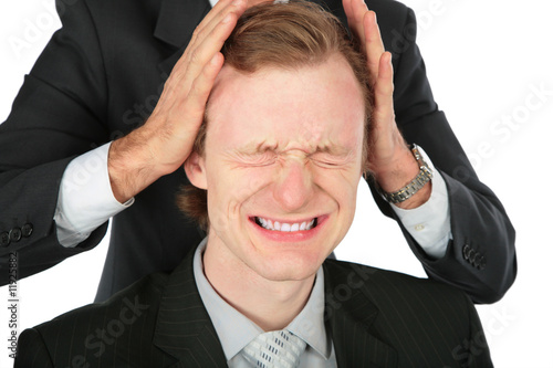 One businessman holds another for head photo