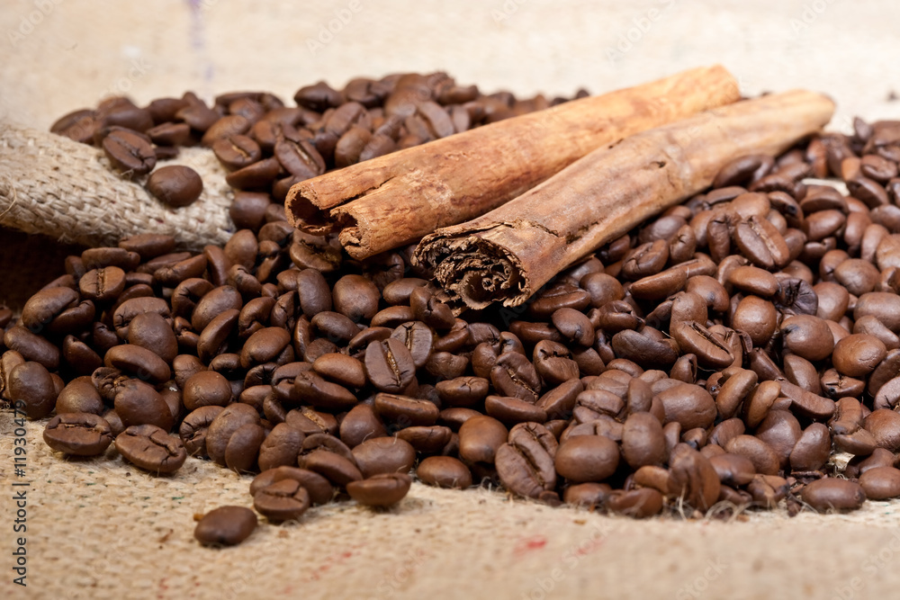 Cinnamon sticks and roasted coffee beans Cinnamon sticks and roasted coffee beans