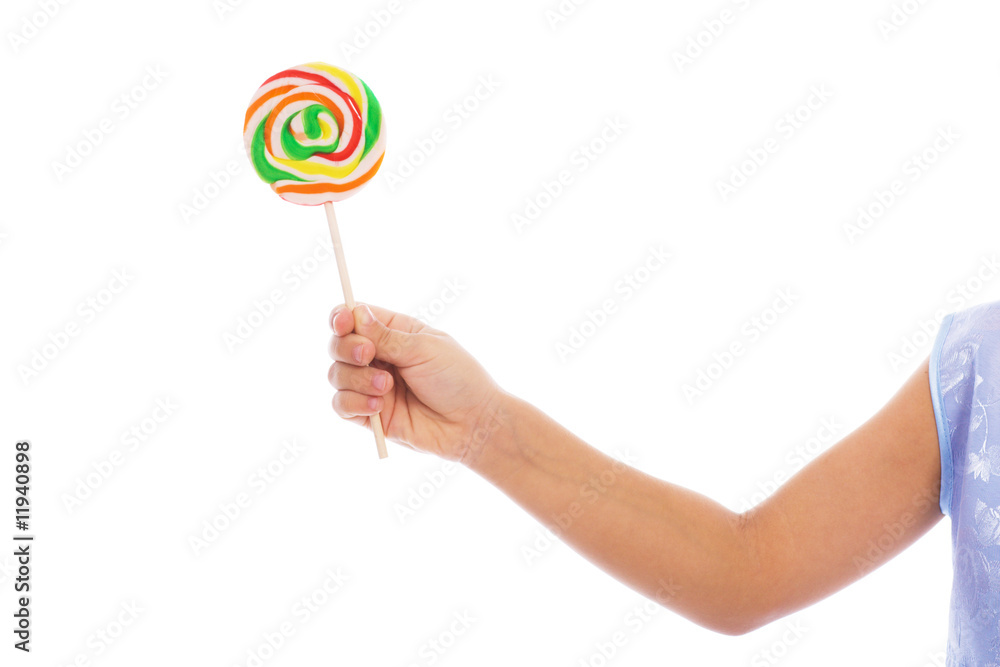 Color lollipop in child hand Color lollipop in child hand