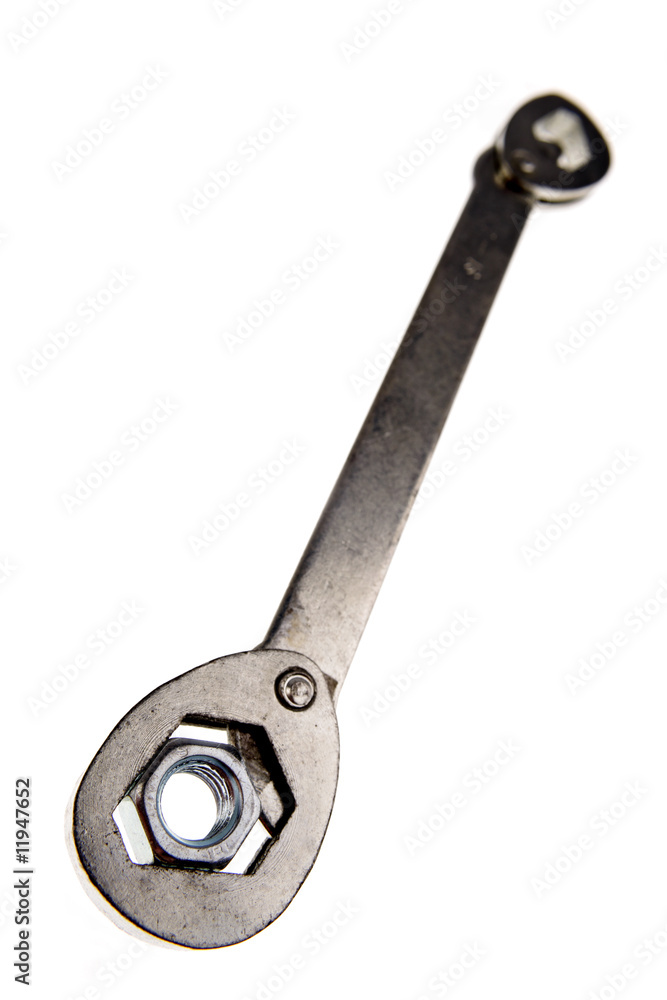 Wrench and nut isolated on white background Wrench and nut isolated on white background