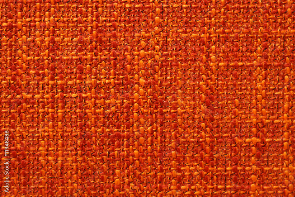 Close up orange fabric background Close up orange fabric background