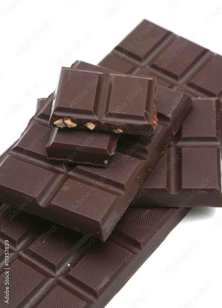 It is a lot of segments of chocolate on a white background It is a lot of segments of chocolate on a white background