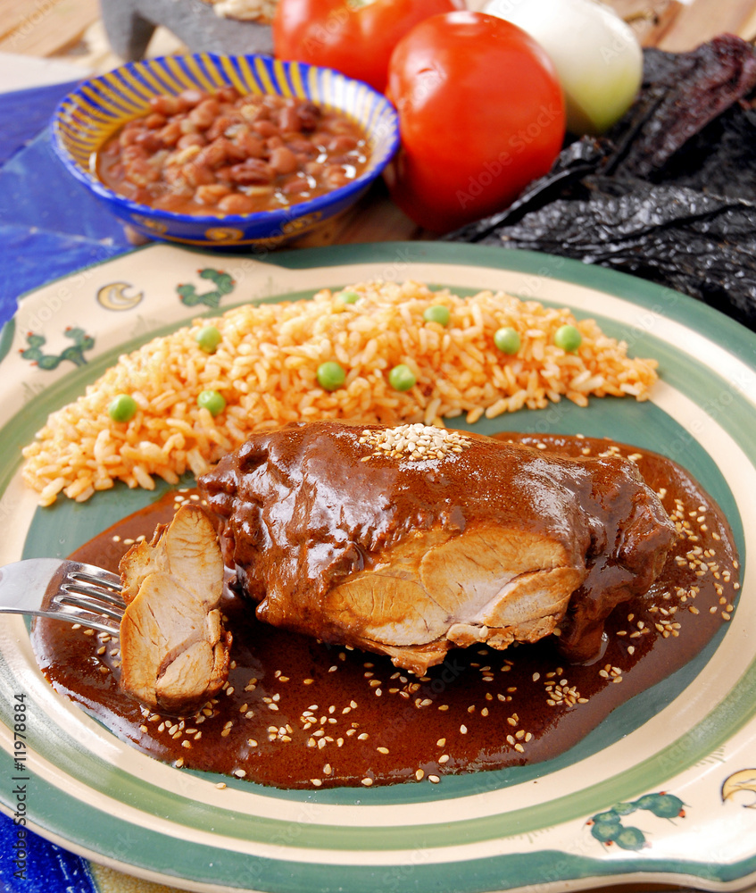 Mole con pollo y arroz rojo. México Stock Photo | Adobe Stock