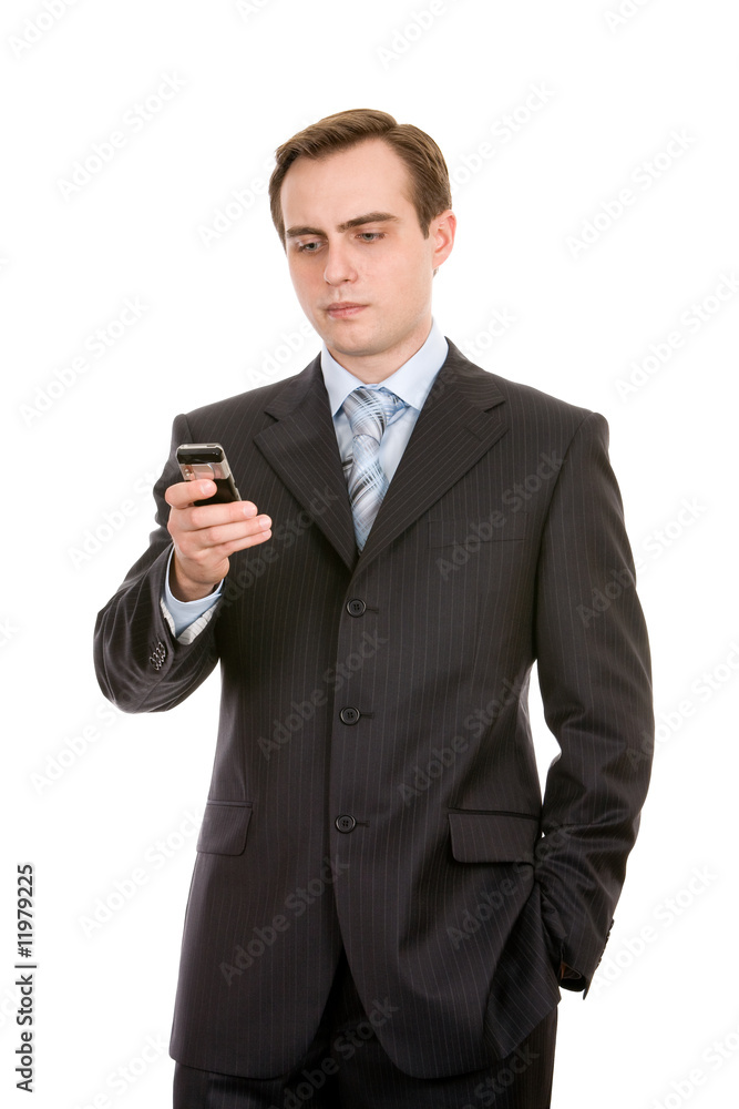 Young businessman with a mobile phone. Isolated on white. Young businessman with a mobile phone. Isolated on white.