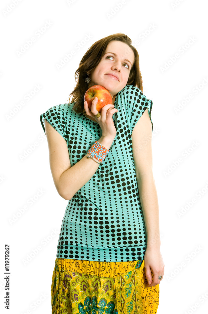 Beautiful young girl with an applle. Isolated on white. Beautiful young girl with an applle. Isolated on white.