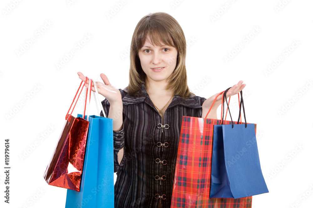 Beautiful girl with shopping bags. Isolated on white Beautiful girl with shopping bags. Isolated on white