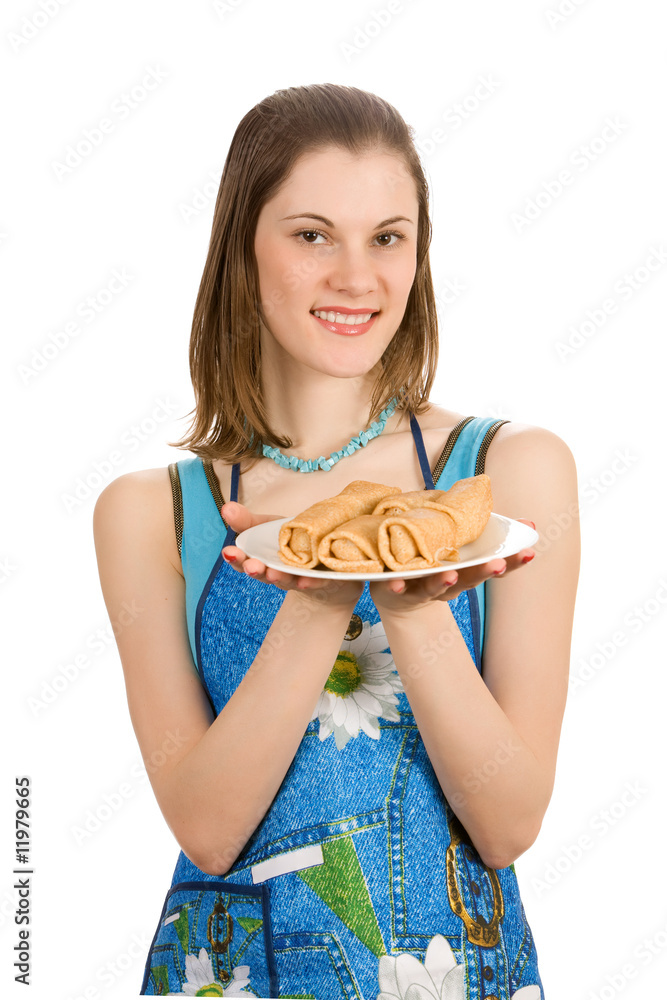 Beautiful girl with a plate of pancakes. Isolated on white. Beautiful girl with a plate of pancakes. Isolated on white.