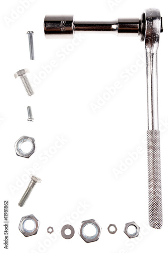 Wrench, nuts and bolts isolated over white