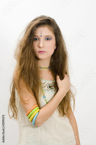 Long haired fashion girl showing bracelets