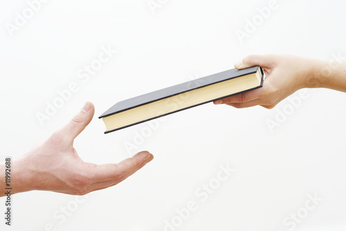Hand Holding Book