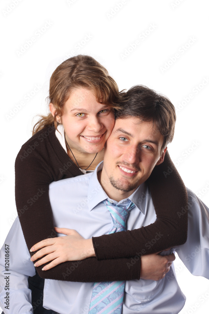 Couple in love smiling. Over white background Couple in love smiling. Over white background