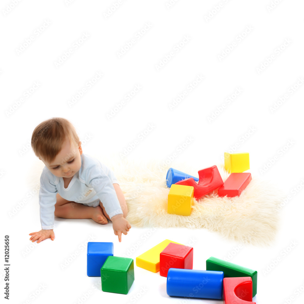 Baby playing with bright blocks Baby playing with bright blocks