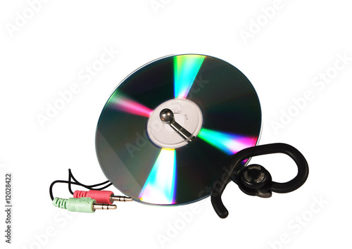 Isolated DVD-disk and accessories on a white background