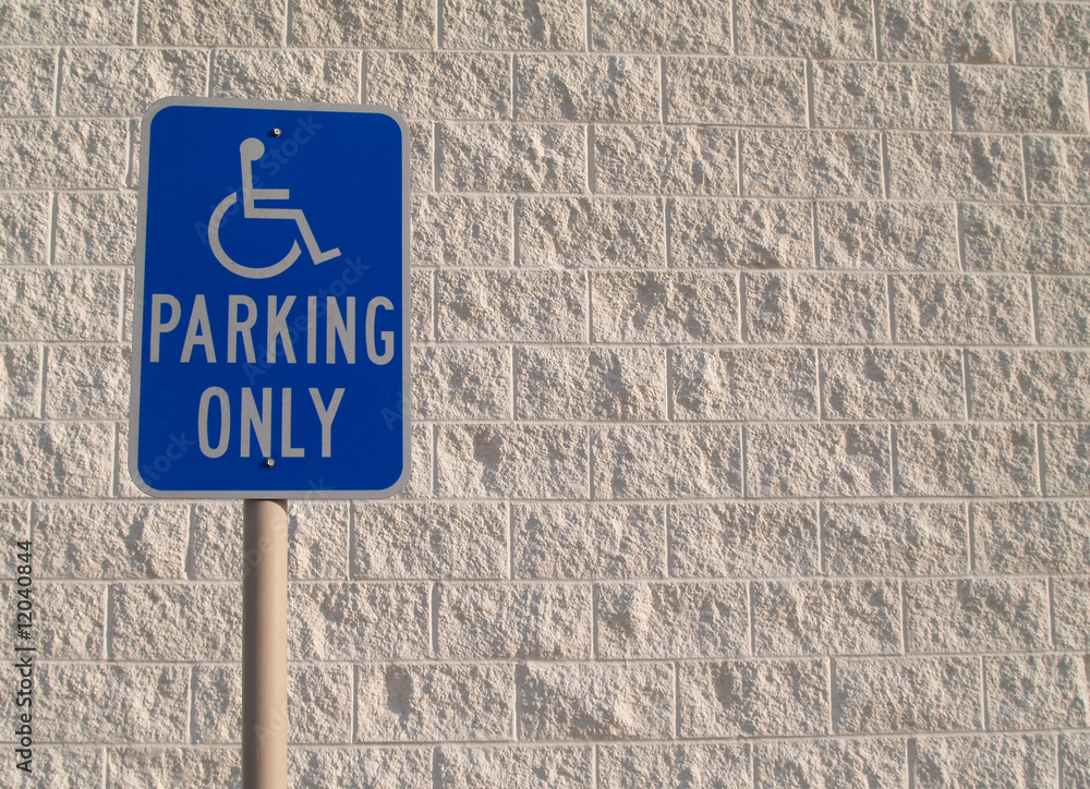 Handicap Parking Sign with White Textured Background Handicap Parking Sign with White Textured Background