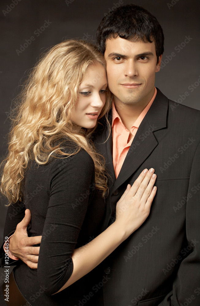 Beatiful couple on black background