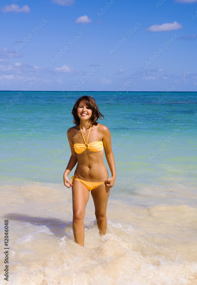 beautiful Polynesian girl in  bikini on a Hawaii beach
