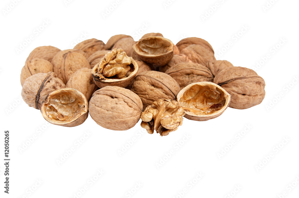 Heap of fresh walnuts isolated on white. Heap of fresh walnuts isolated on white.
