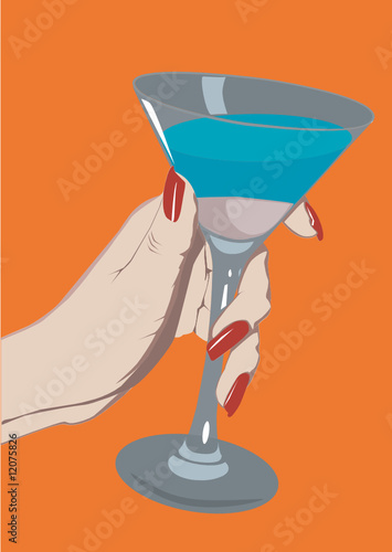 Hand with a glass of martini.