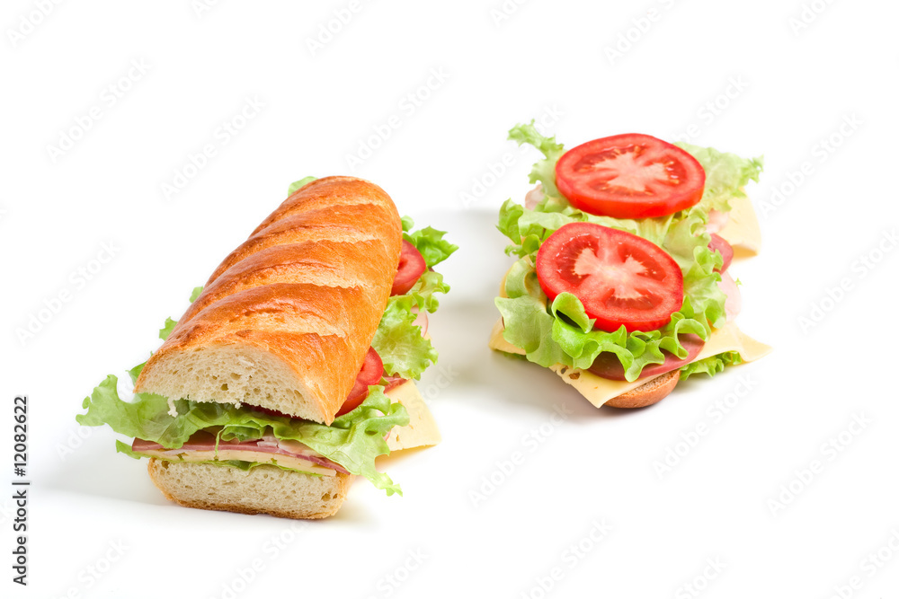 two halves of long fresh baguette sandwich