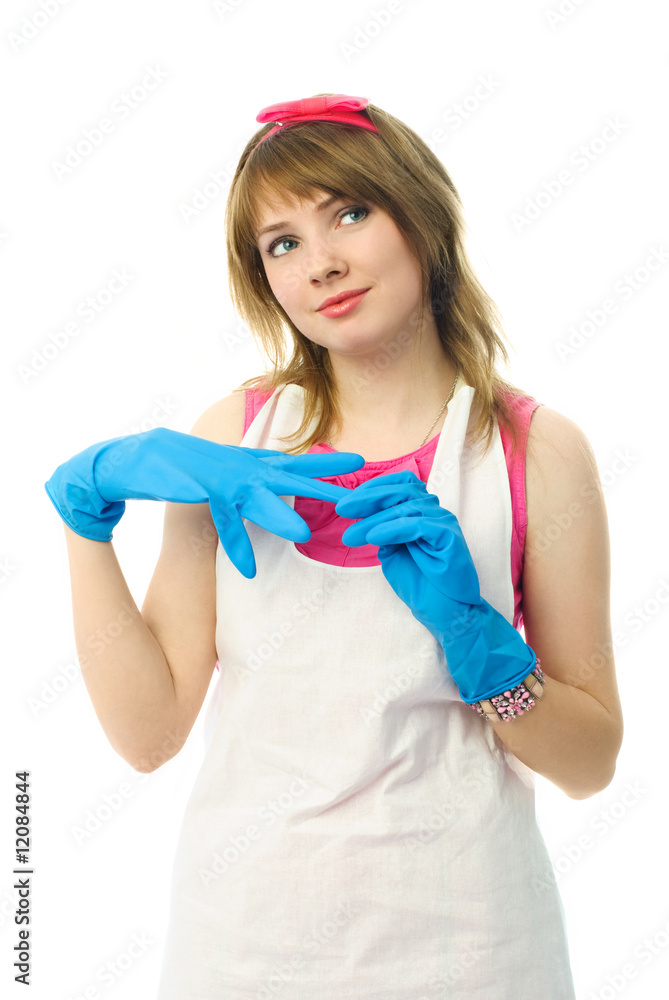dreamy housewife putting on rubber gloves dreamy housewife putting on rubber gloves