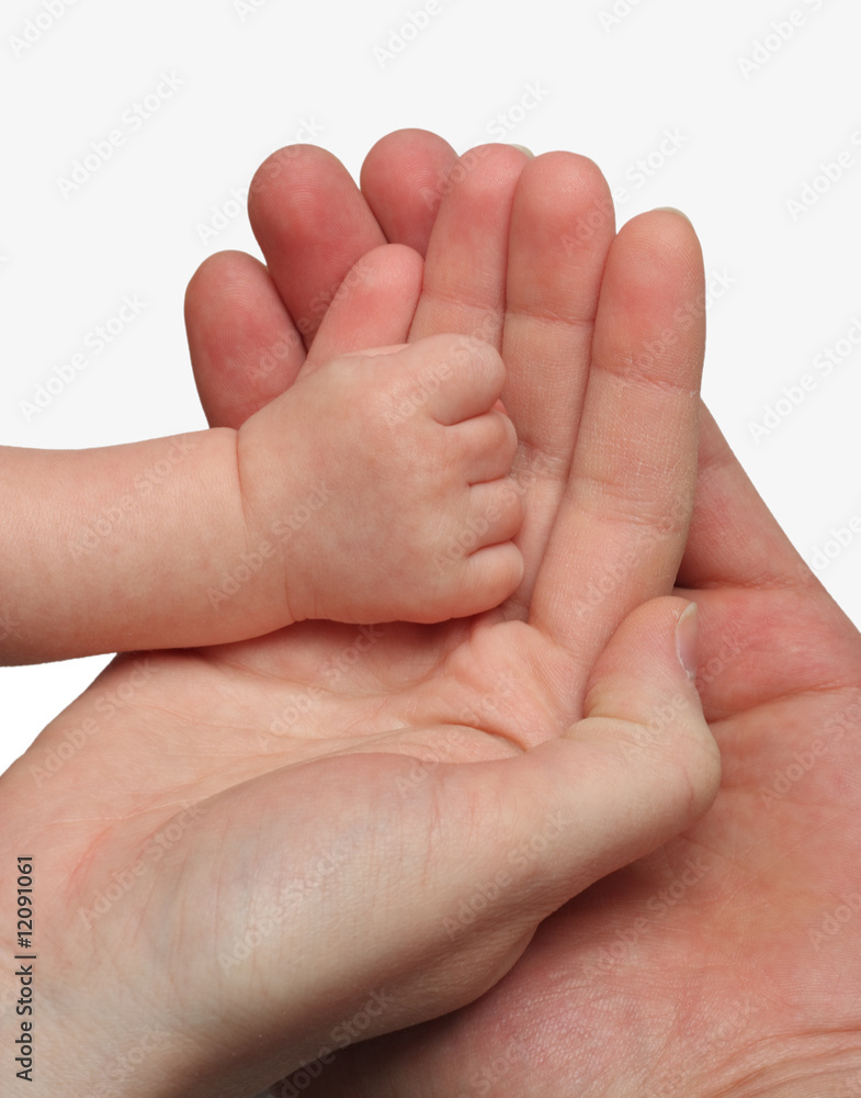 Mother and father holding their child's hand. Family concept Mother and father holding their child's hand. Family concept