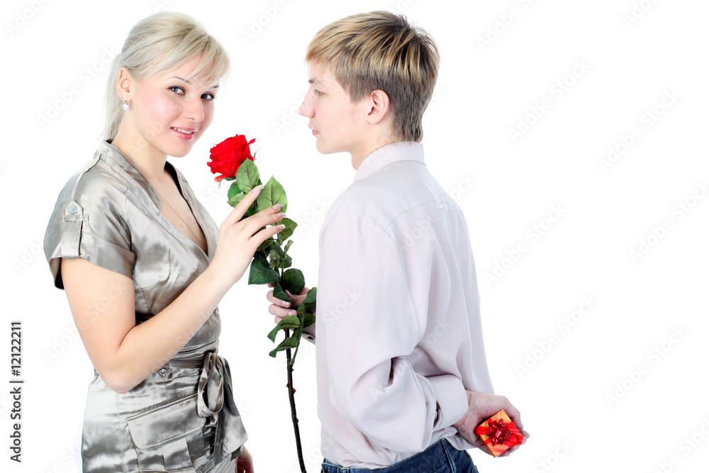 couple with gift and flower isolated on white couple with gift and flower isolated on white
