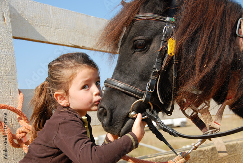 Foto l'enfant et son poney