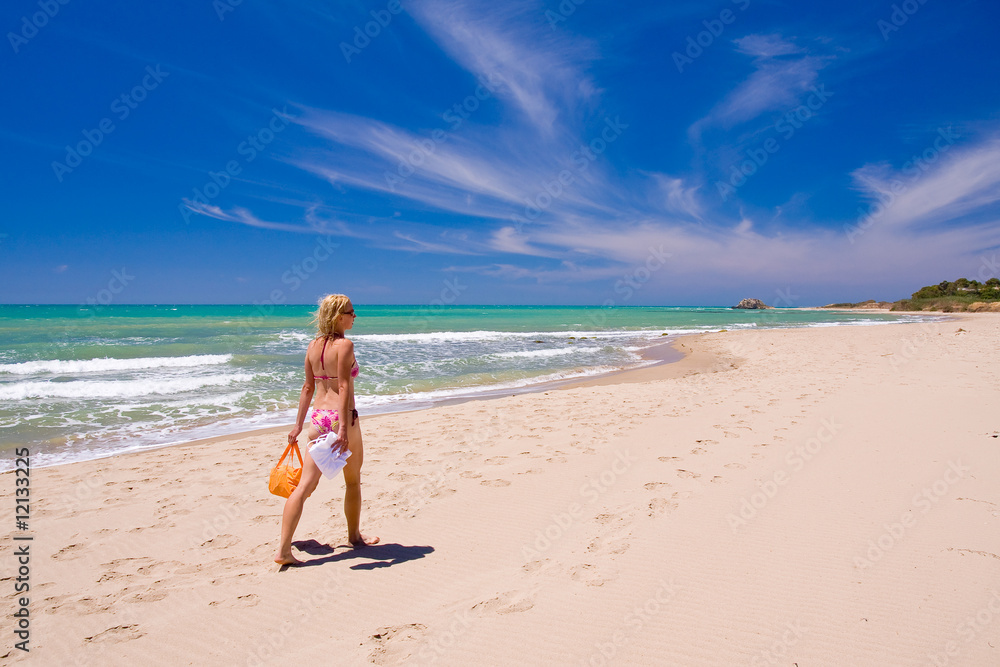 a beutiful woman on the beach in Mediterranean