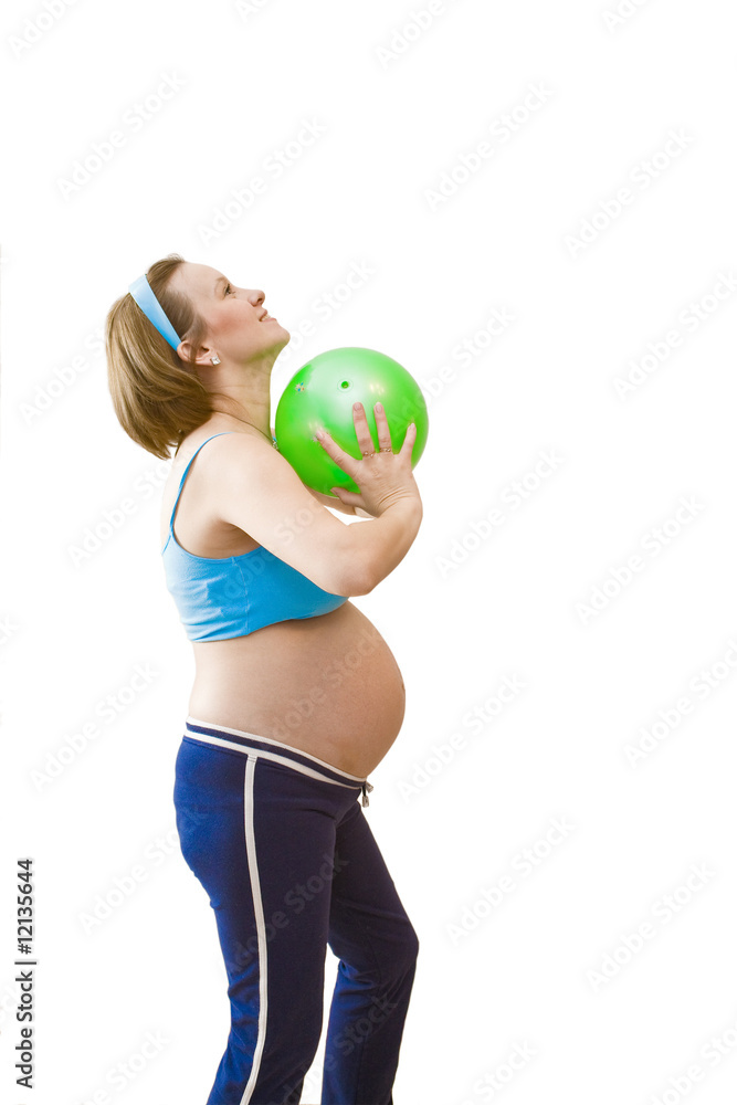 Young pregnant woman with green ball Young pregnant woman with green ball