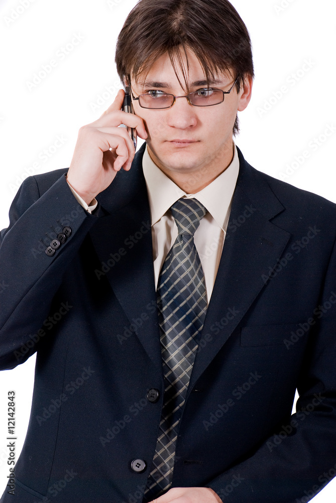 young businessman calling by cellular phone young businessman calling by cellular phone