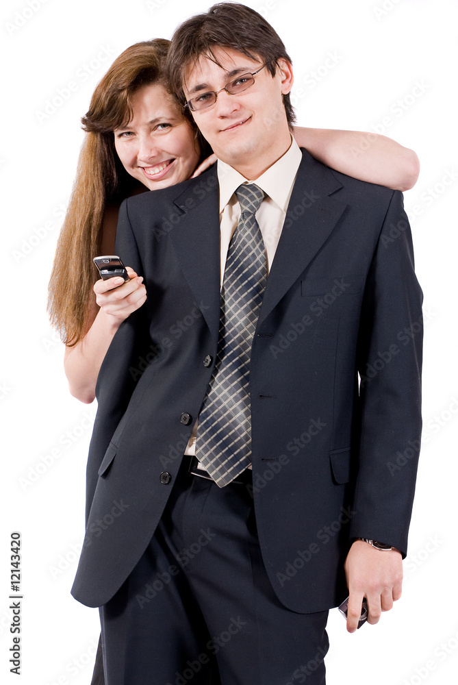 Young couple talking on the phone isolated on white Young couple talking on the phone isolated on white