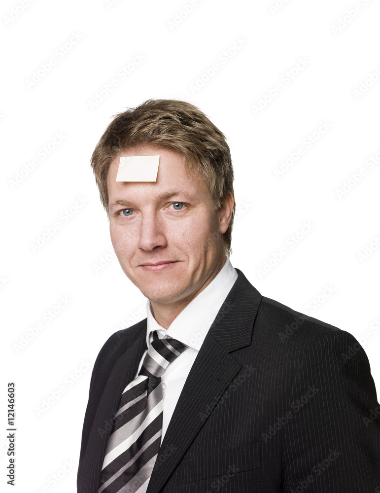 Man with a postit-note in his face Man with a postit-note in his face